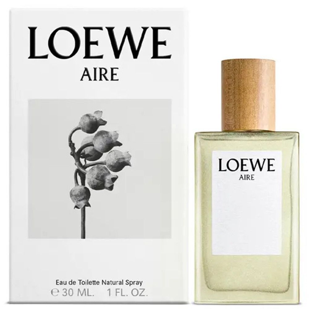 Flacon Loewe Aire Edt Spray et emballage. Flacon rectangulaire, jaune clair. Emballage blanc avec motif floral.