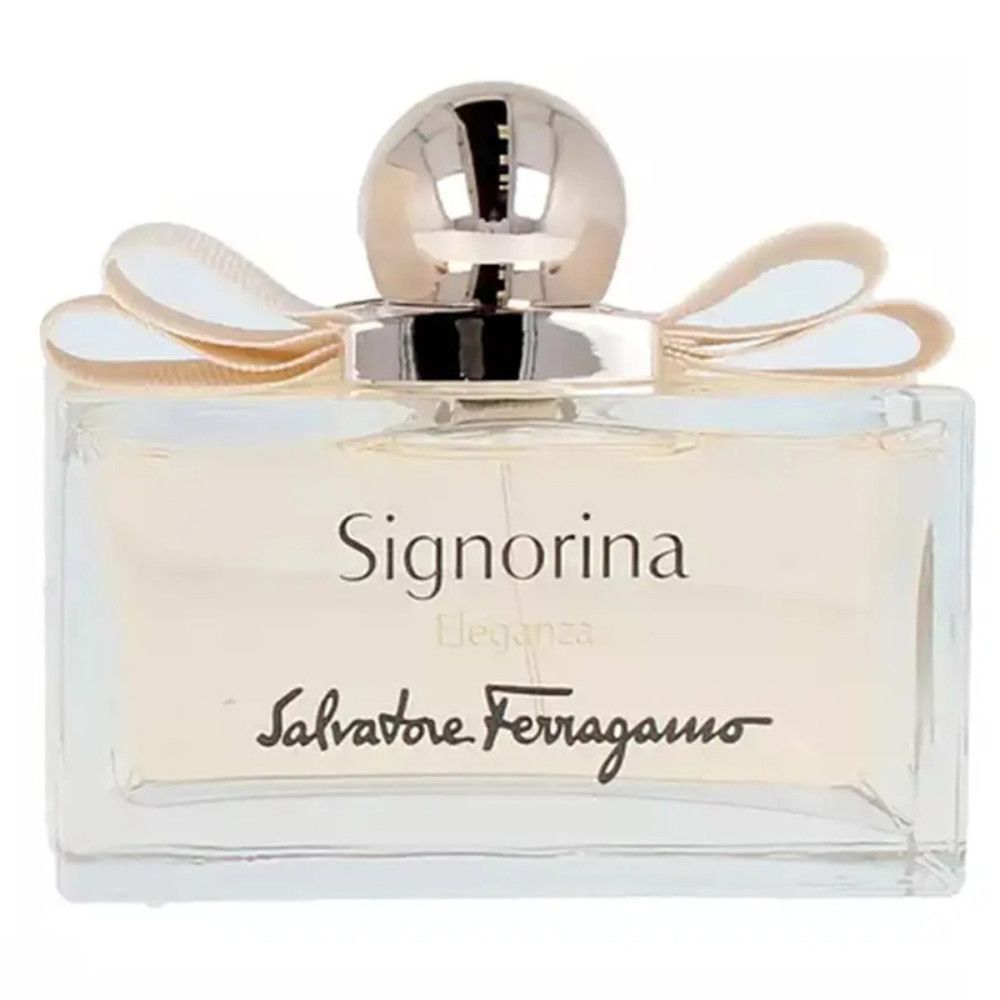 Flacon de parfum avec contenu clair, nœud et bouchon. Inscription Signorina Eleganza et logo. Forme rectangulaire.