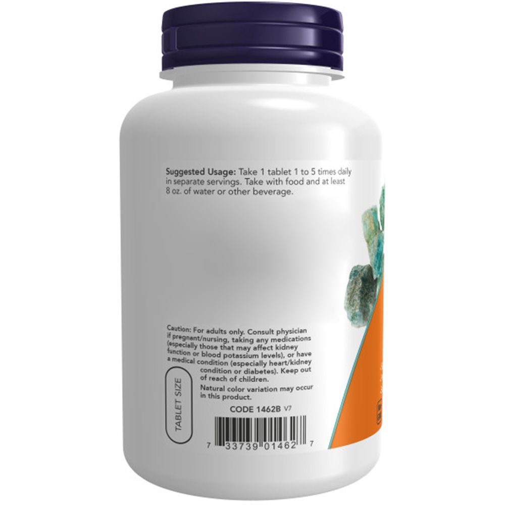 Achterkant fles. Opschrift: Suggested Usage. Code 1462B V1. Groene en oranje etiketten.