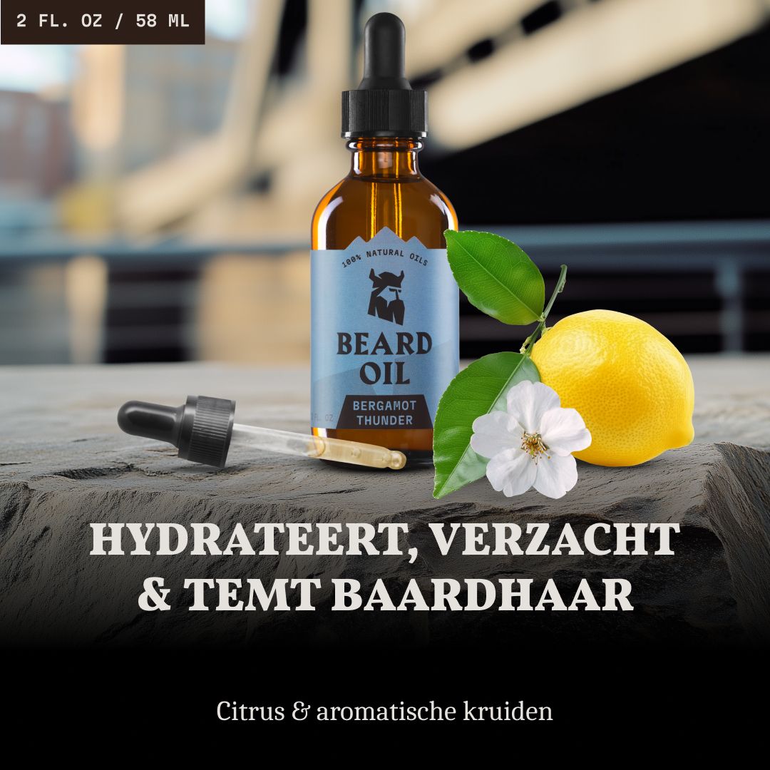 Fles baardolie met druppelaar, citroen en bloem op steen. Tekst: Hydrateert, verzacht en temt baardhaar.