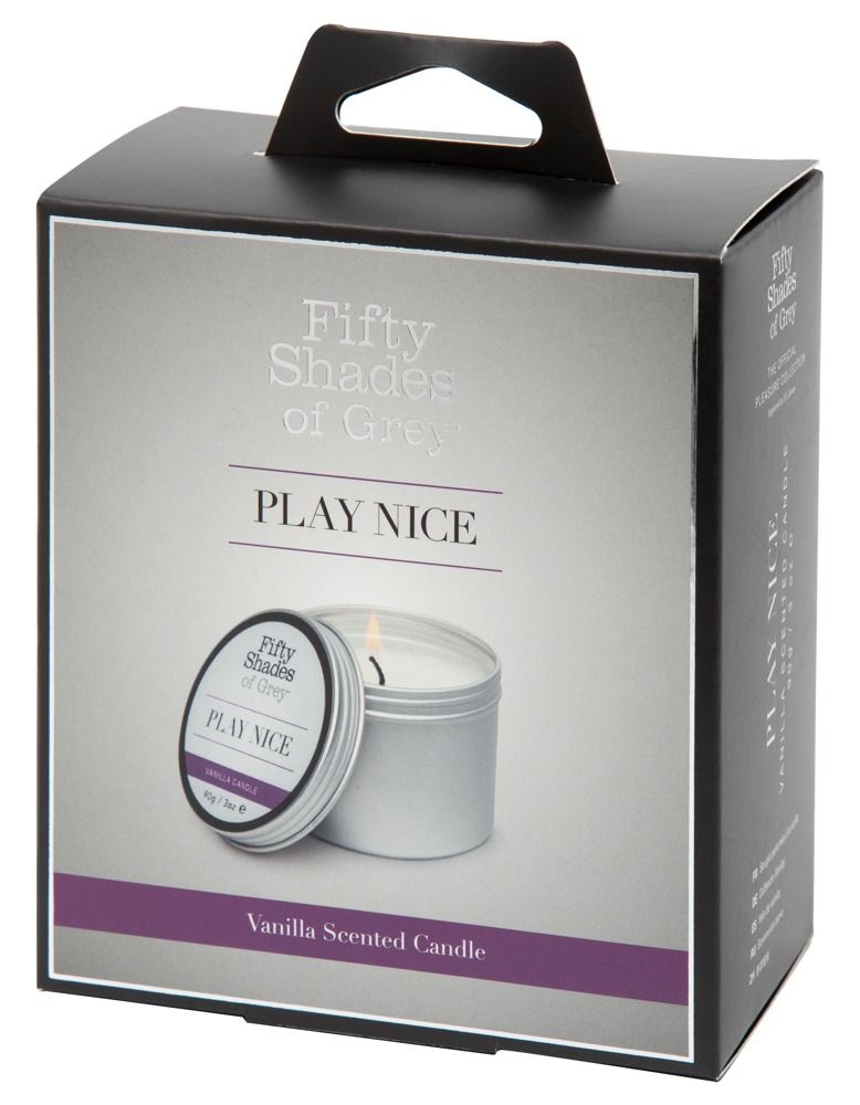 Boîte cadeau noire avec poignée. Inscription : "Fifty Shades of Grey", "PLAY NICE" et "Vanilla Scented Candle". Une bougie avec couvercle.