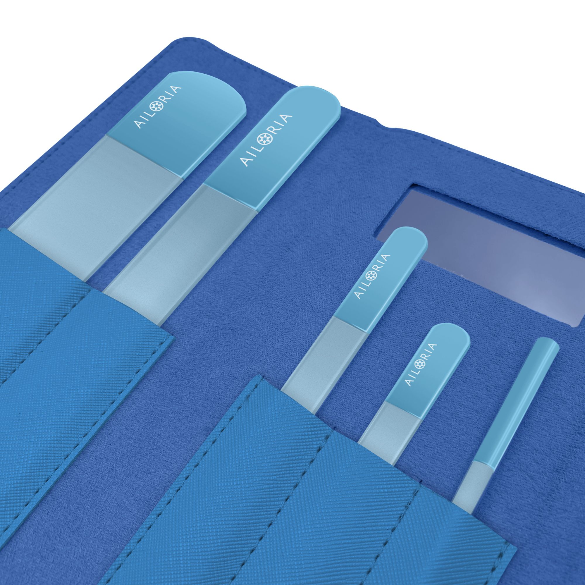 Vue intérieure de l'étui bleu. Quatre limes à ongles en verre de différentes tailles. Logo AILORIA visible.
