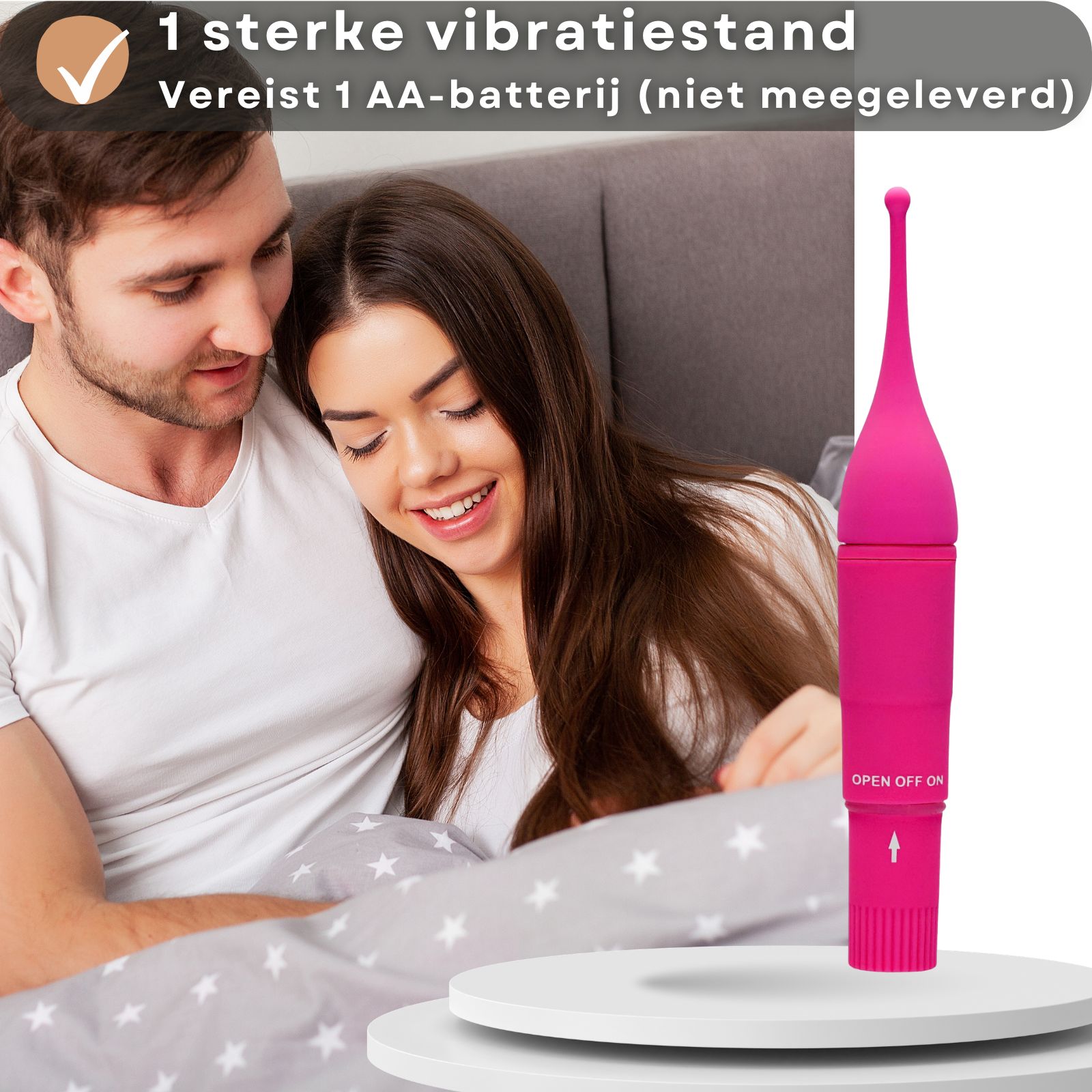 Roze vibrator en hand. Afmetingen: 10 cm hoog, 2,5 cm breed. Tekst: Totale lengte 16 cm.