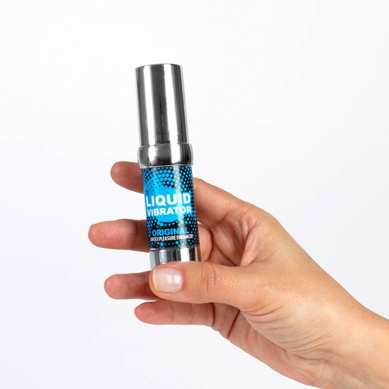 Secret Play Liquid Vibrator Original (15 ml) in de hand.