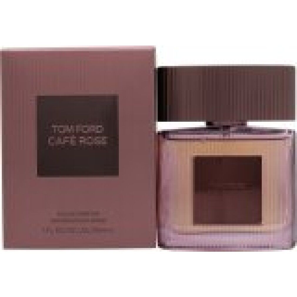 Flacon de parfum rose avec emballage. "TOM FORD Café Rose" est inscrit sur l'emballage et le flacon.
