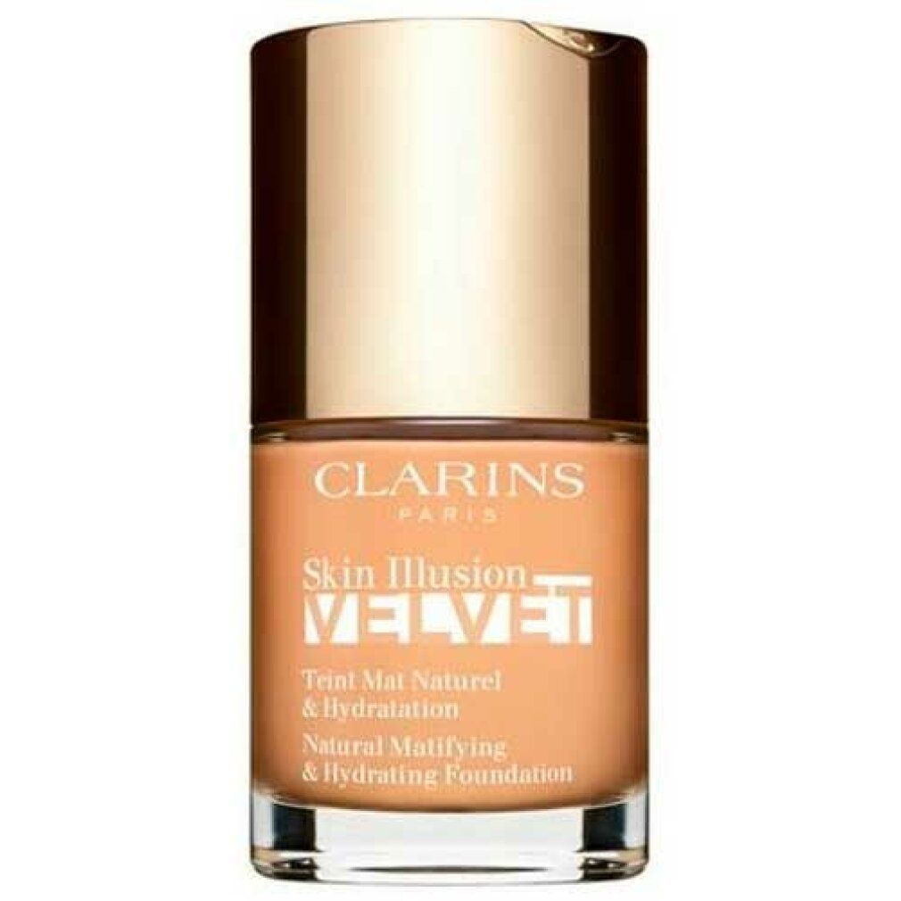 Fond de teint Clarins Skin Illusion Velvet dans un flacon en verre avec un capuchon doré.