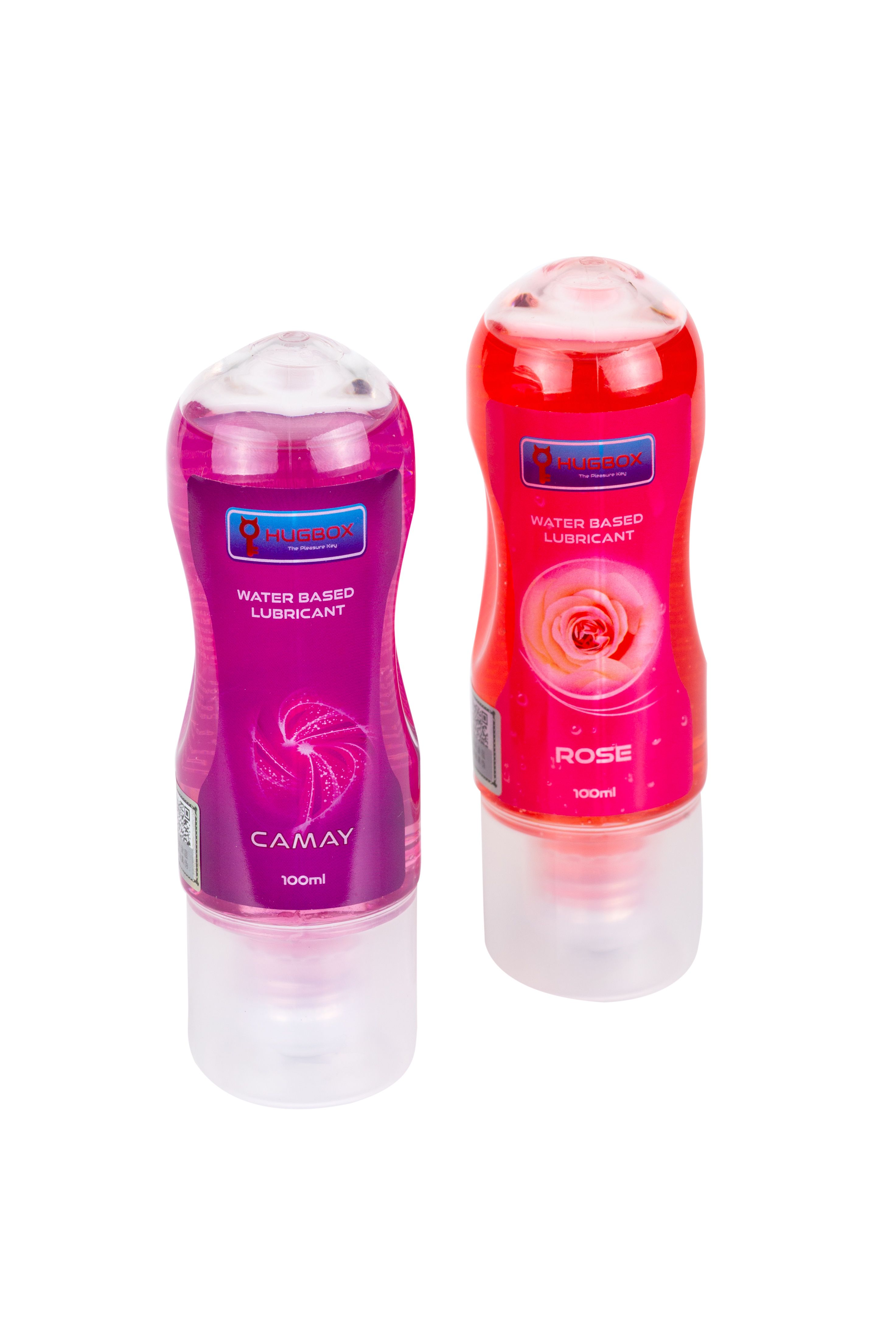 Twee flessen met roze en rode vloeistof. Opschriften CAMAY en ROSE. WATER BASED LUBRICANT.