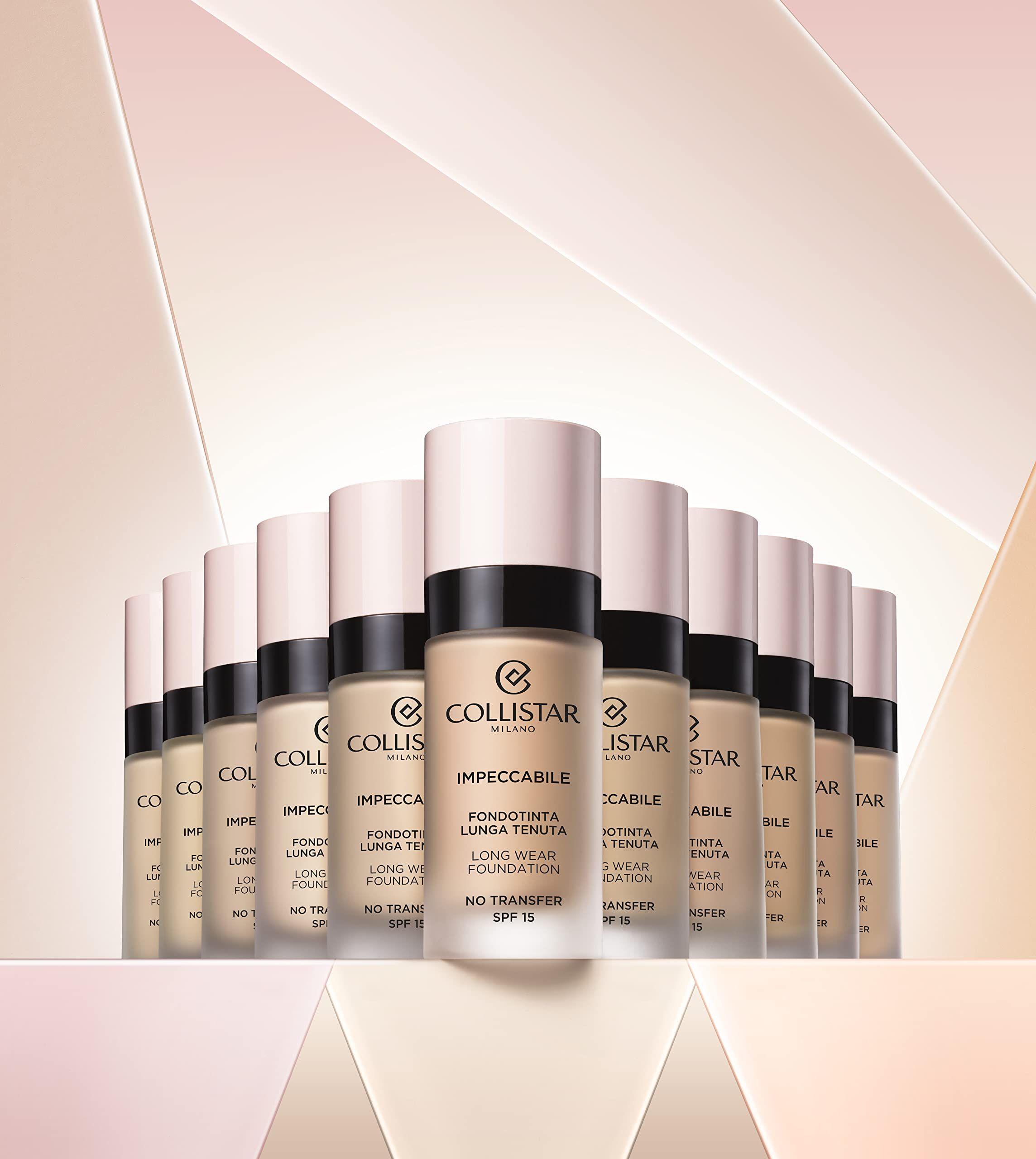 Meerdere foundation flesjes. Roze dop, zwarte ring, opschrift. "Collistar Milano", "Impeccabile", "Long Wear Foundation". SPF 15.