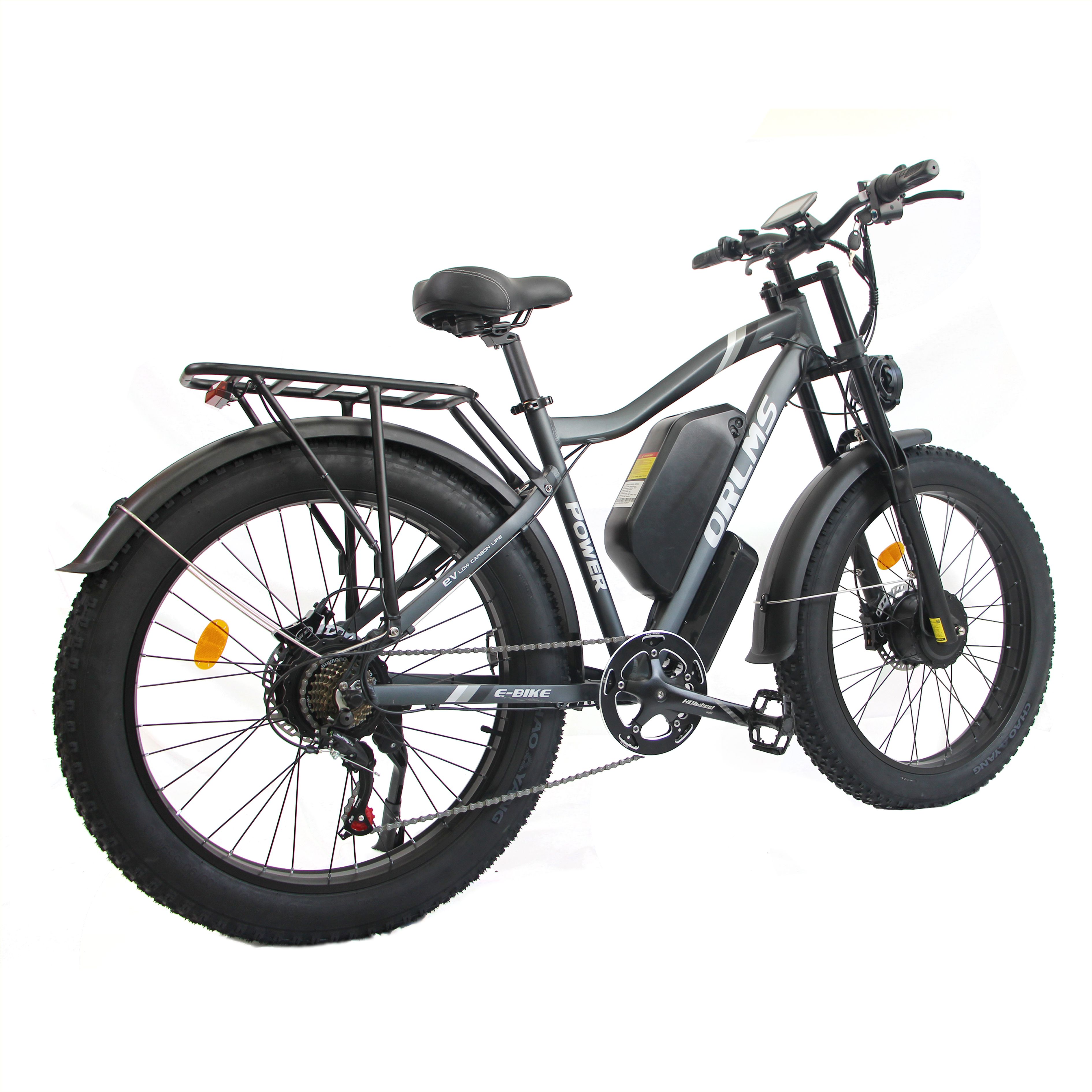 Grijze e-bike ORLMS MX500 met brede banden, bagagerek en koplamp. Zijaanzicht.