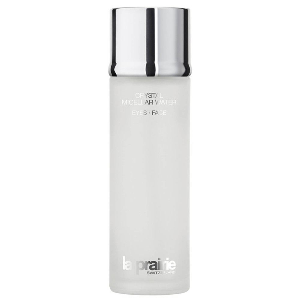 Cilindrische fles met zilveren dop. Opschrift: Crystal Micellar Water, Eyes Face. Merk: la prairie.