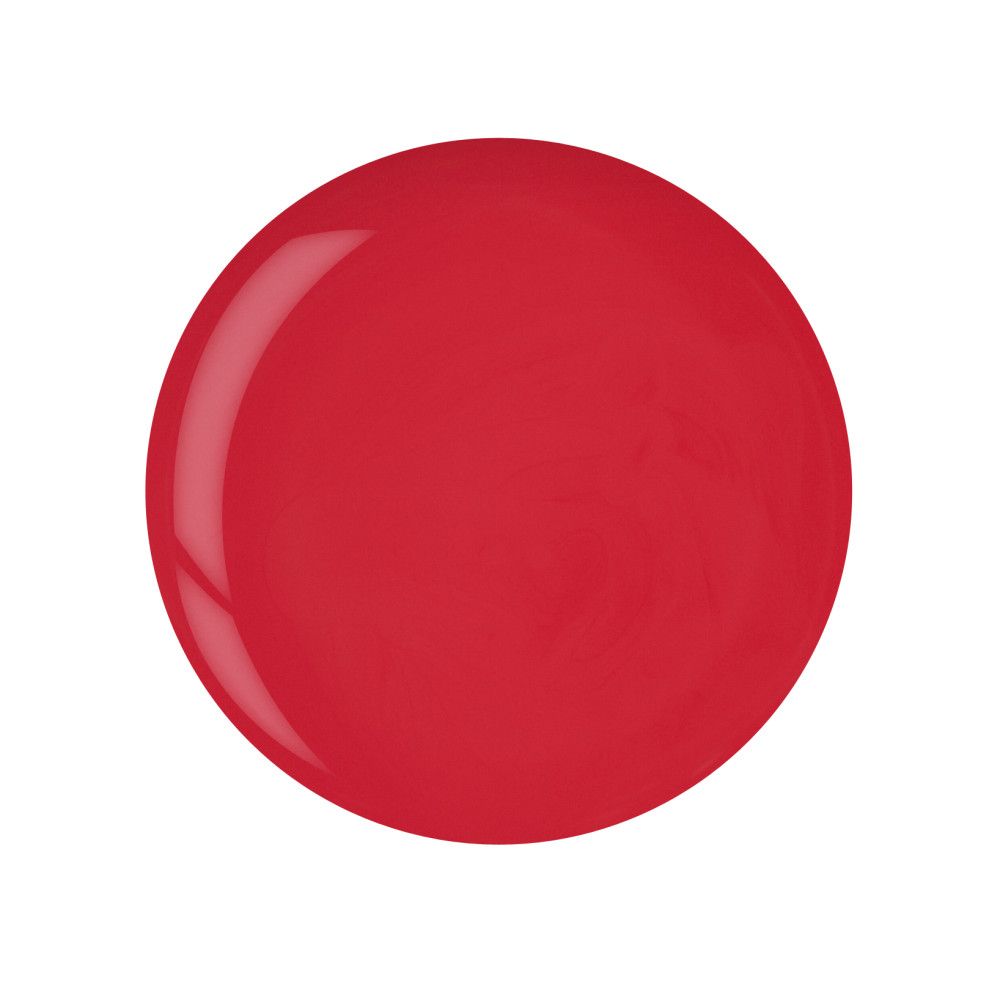 Tache de vernis à ongles rouge, circulaire. Surface brillante.