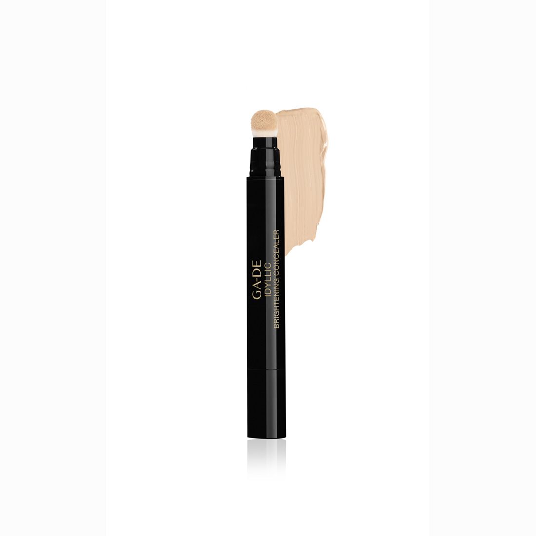 Stylo noir avec applicateur clair et trace de couleur. Inscription: GA-DE IDYLLIC Brightening Concealer.
