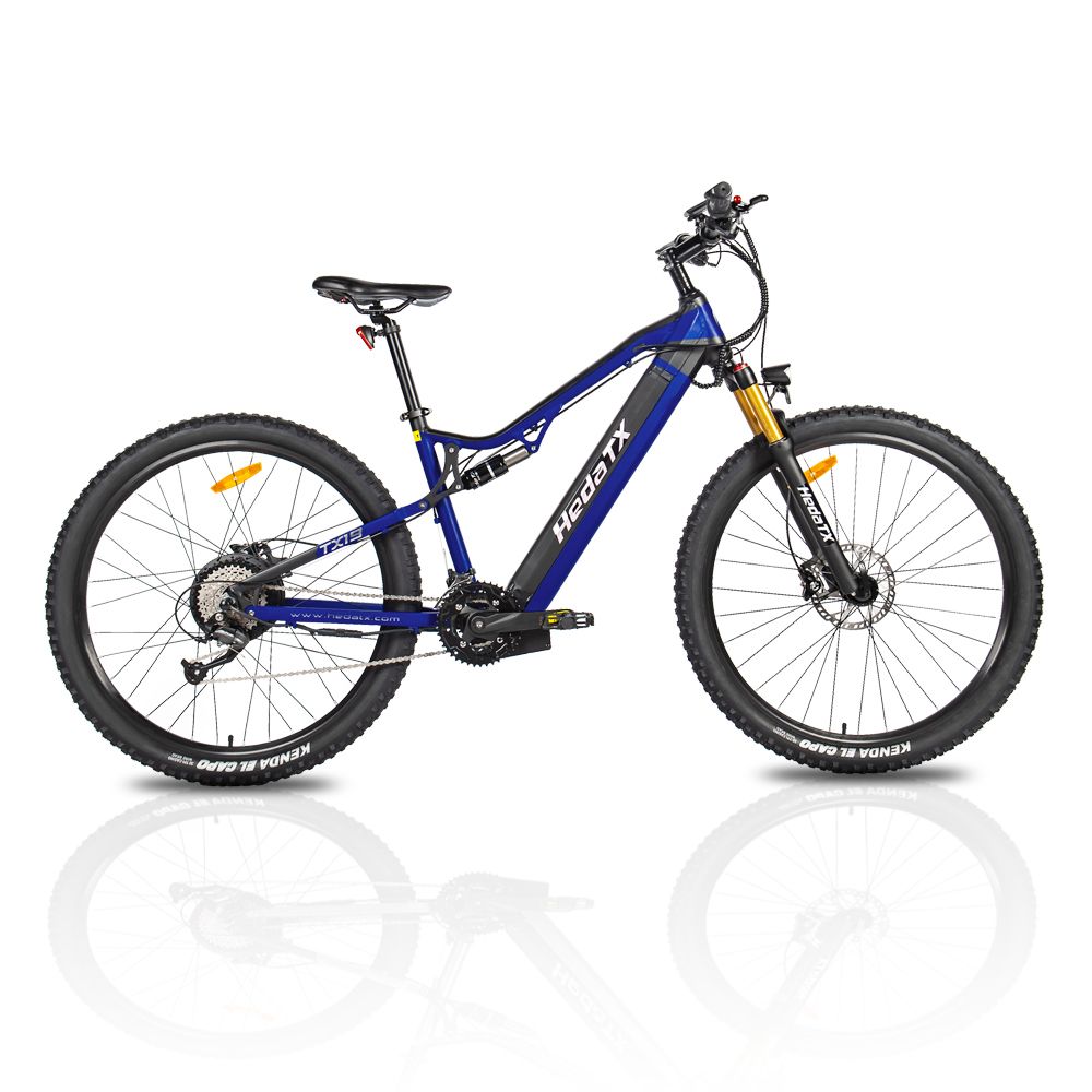 VTT électrique bleu HedaTX TX19. Pneus noirs, fourche dorée, selle noire. Inscription HedaTX. Vue latérale.
