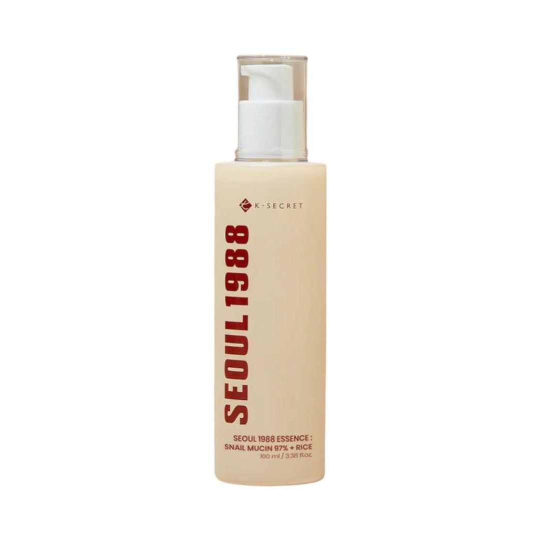 Flacon K-SECRET Seoul 1988 Essence avec pompe. Flacon beige avec inscription rouge.