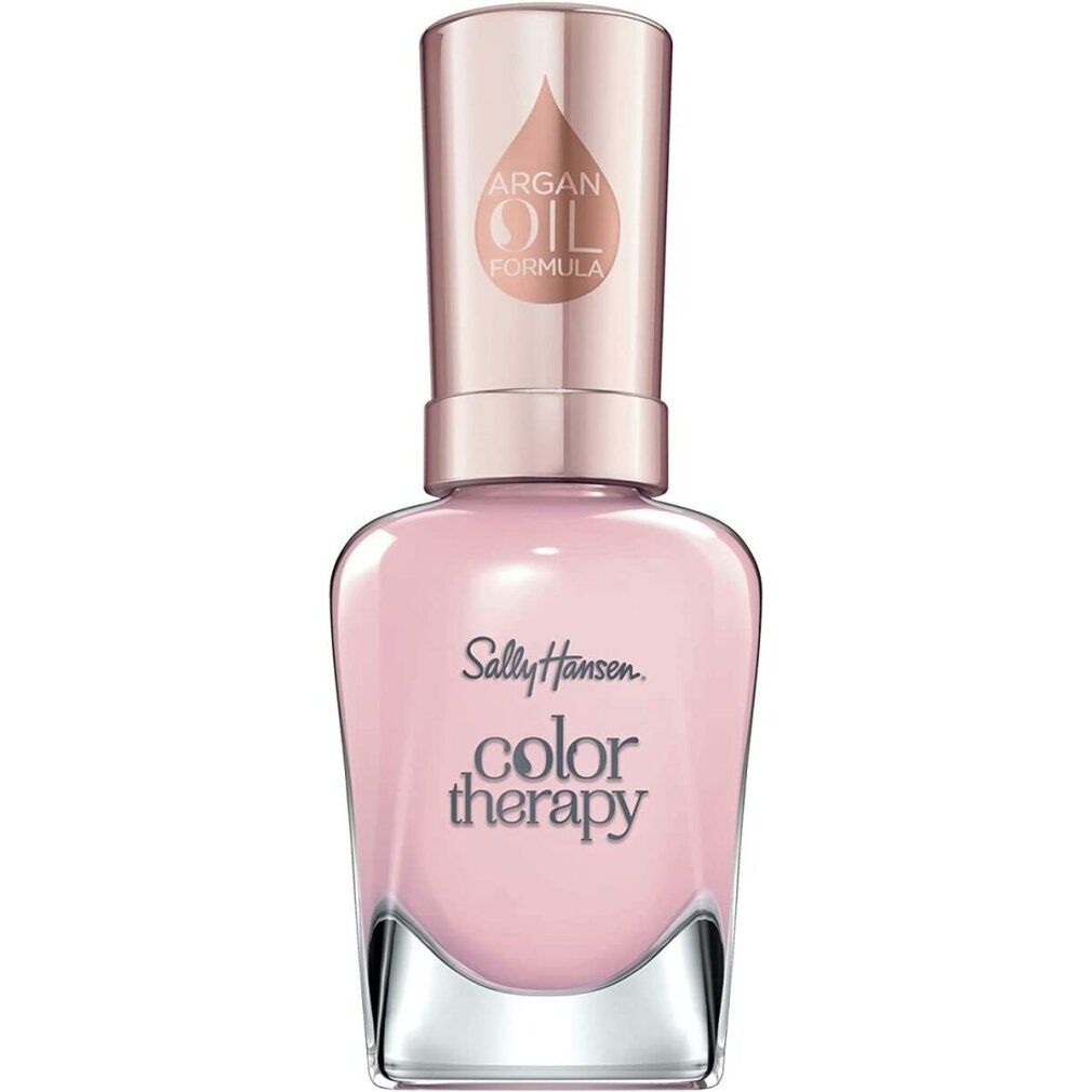 Flacon de vernis à ongles rose clair. Inscription: Sally Hansen Color Therapy. Bouchon avec logo formule à l'huile d'argan.