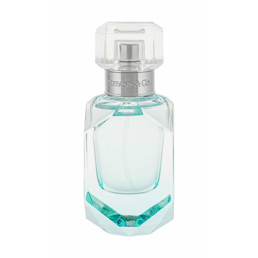 Flacon de parfum Tiffany & Co. en verre transparent facetté avec un ruban argenté.
