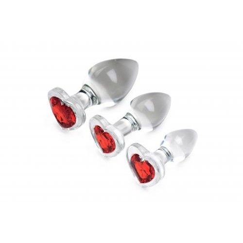 Set van drie anale plugs, transparant glas met rood hart. Verschillende maten.