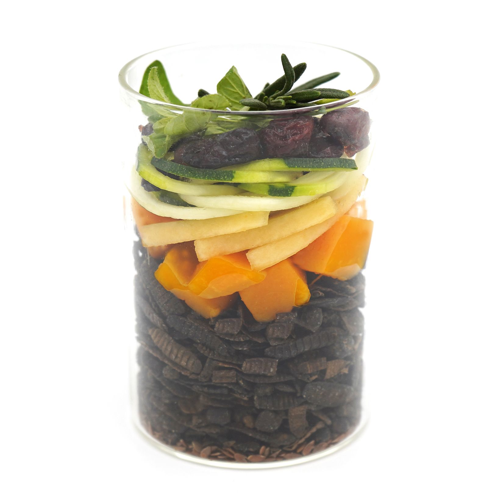 Aliments en couches dans un verre. Contient des insectes, des légumes et des herbes.