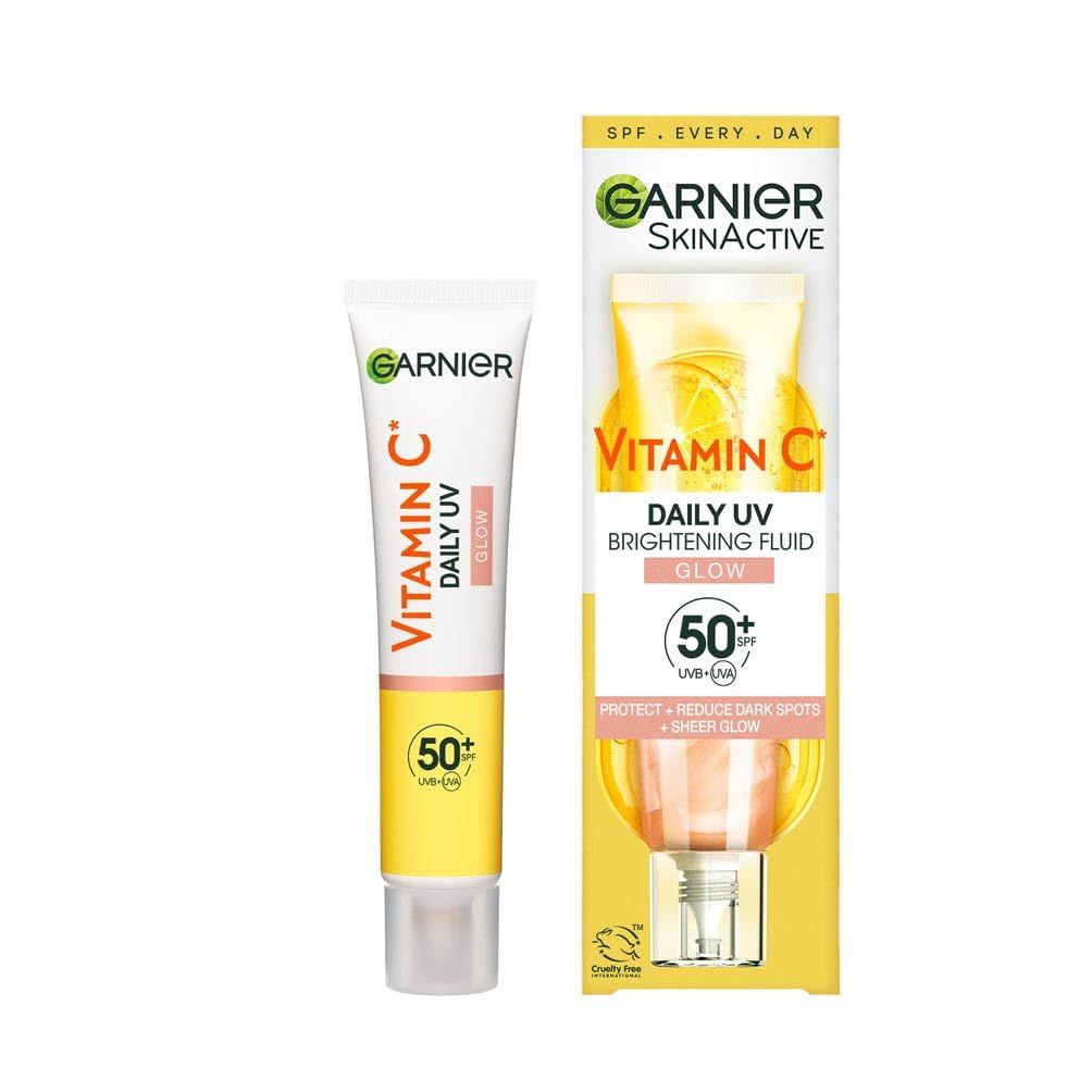 Garnier Vitamin C Daily UV Brightening Fluid. Tube en verpakking. SPF 50+. Tekst: Beschermt, vermindert vlekken, geeft glow.