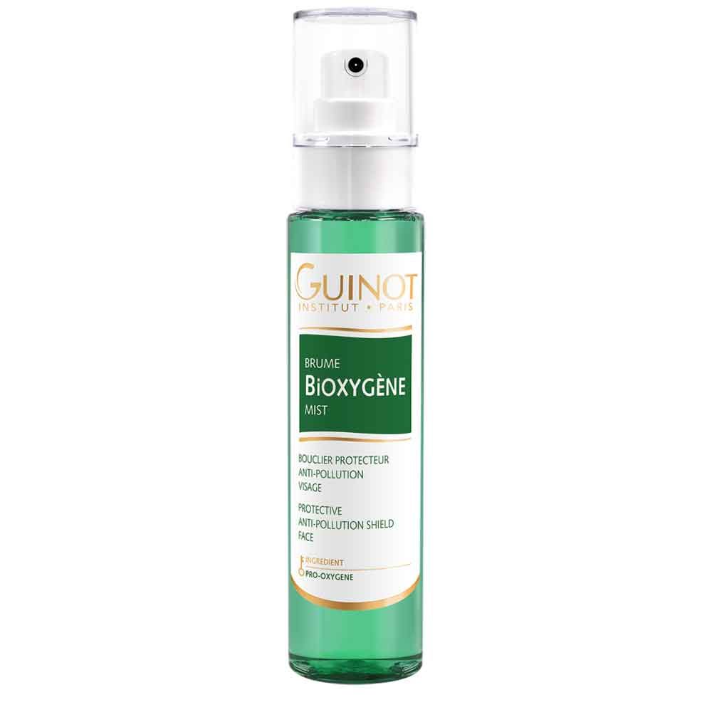 Groene sprayfles met witte sproeikop. Opschrift: Guinot, Brume Bioxygène Mist. Label met tekst: Bouclier Protecteur Anti-Pollution Visage.