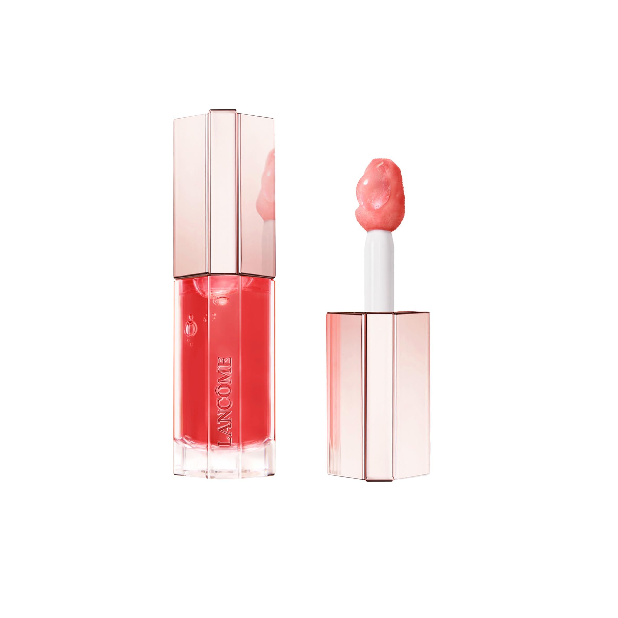 Gloss à lèvres Lancôme Juicy Tubes. Teinte rose. Applicateur et contenant or rose. Ouvert, applicateur visible.