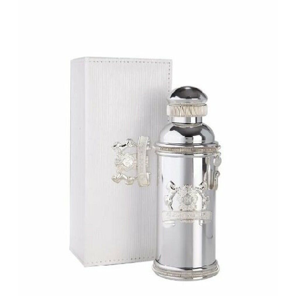 Flacon argenté avec emballage blanc. Flacon avec bouchon et ornements argentés. Emballage blanc avec détail argenté.