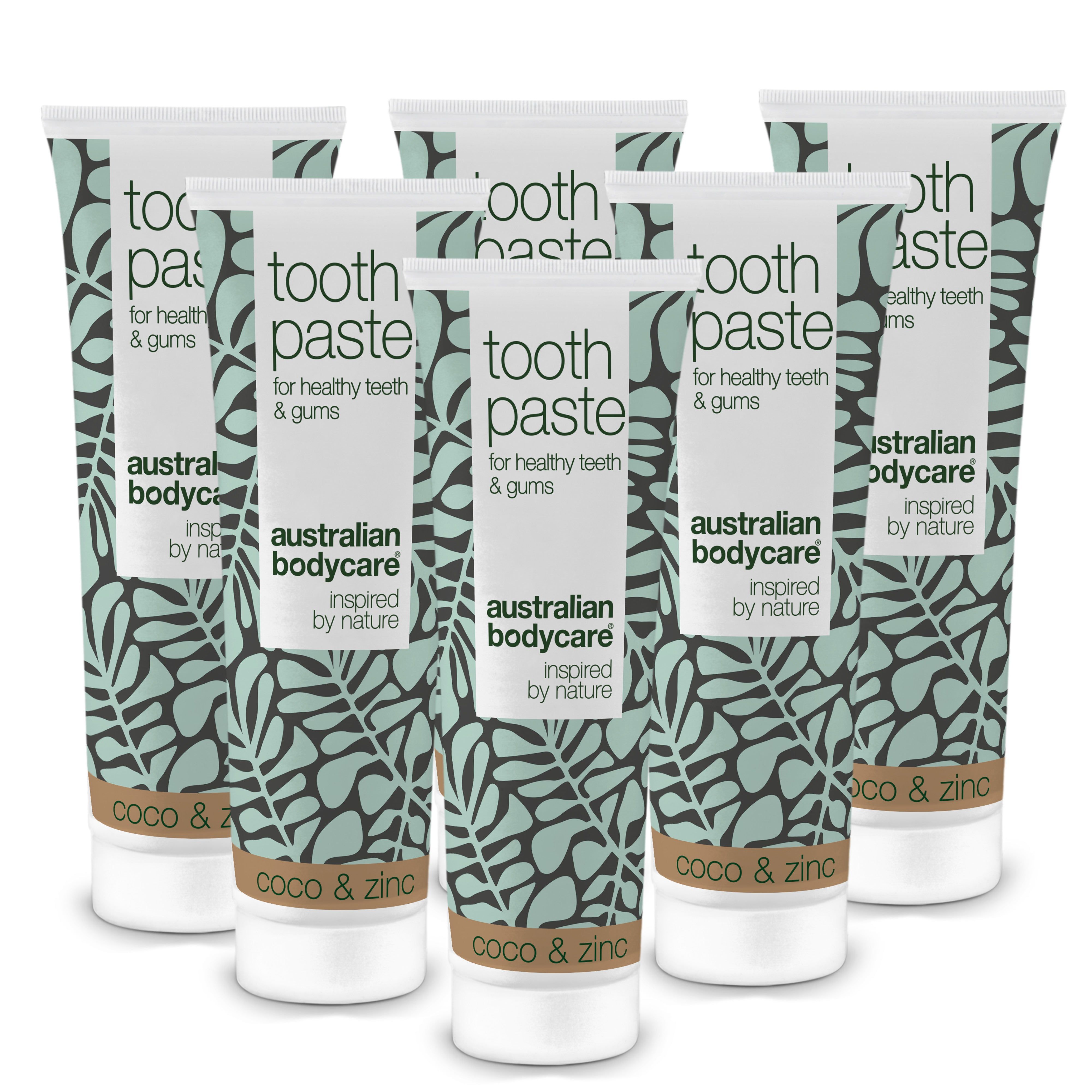 Six tubes de dentifrice, blanc avec des feuilles vertes. Inscription: Australian Bodycare, Coco & Zinc.