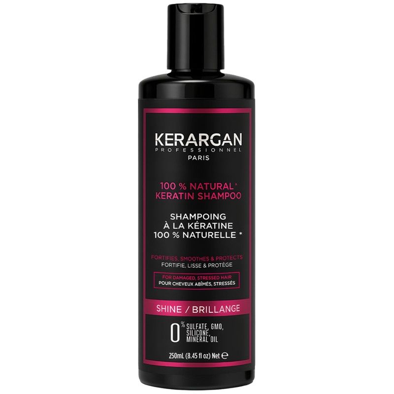 Zwarte shampoo fles met zwarte dop. Opschrift: Kerargan, 100% Natural Keratin Shampoo. Voor beschadigd haar. 250ml.