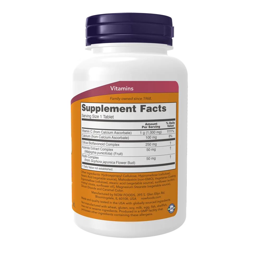 Achterkant witte fles. Etiket met tekst: "Supplement Facts". Bevat vitamine C, calcium, Citrus Bioflavonoid Complex, etc.