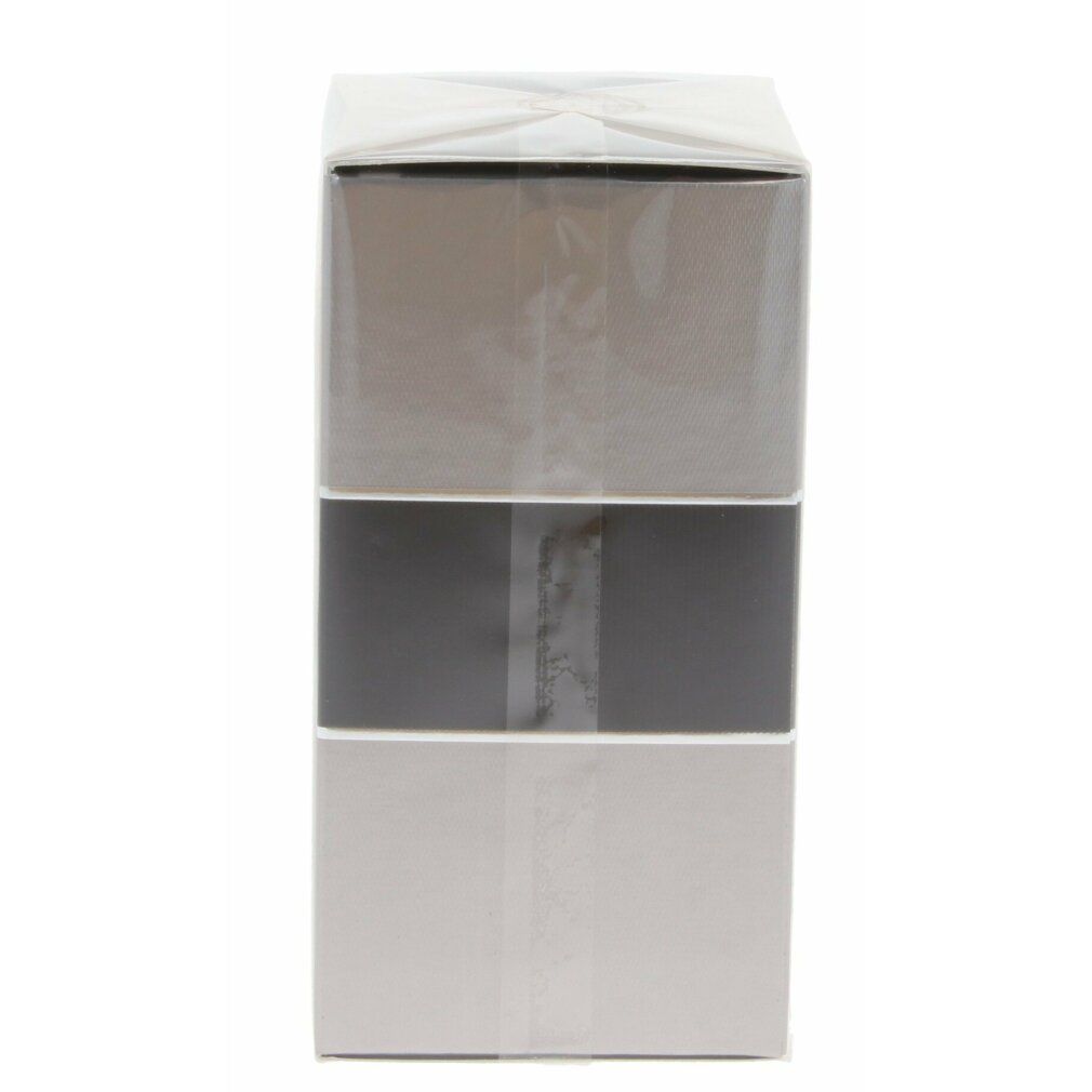 Emballage avec trois bandes horizontales : gris clair en haut, gris foncé au milieu, gris clair en bas.