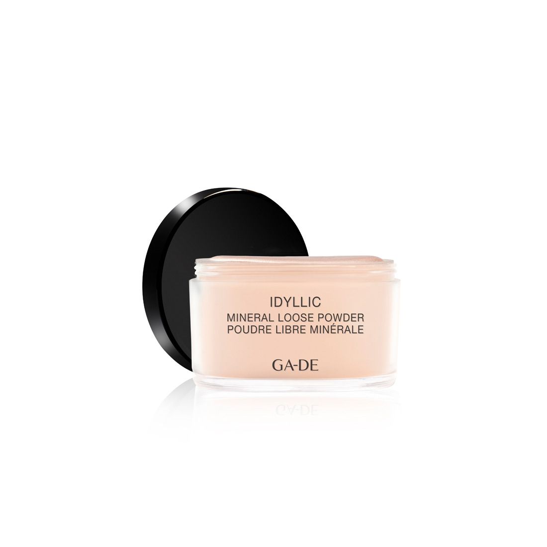 Ga-De Idyllic Mineral Loose Powder. Transparante pot met zwarte deksel. Productnaam en merk zichtbaar.