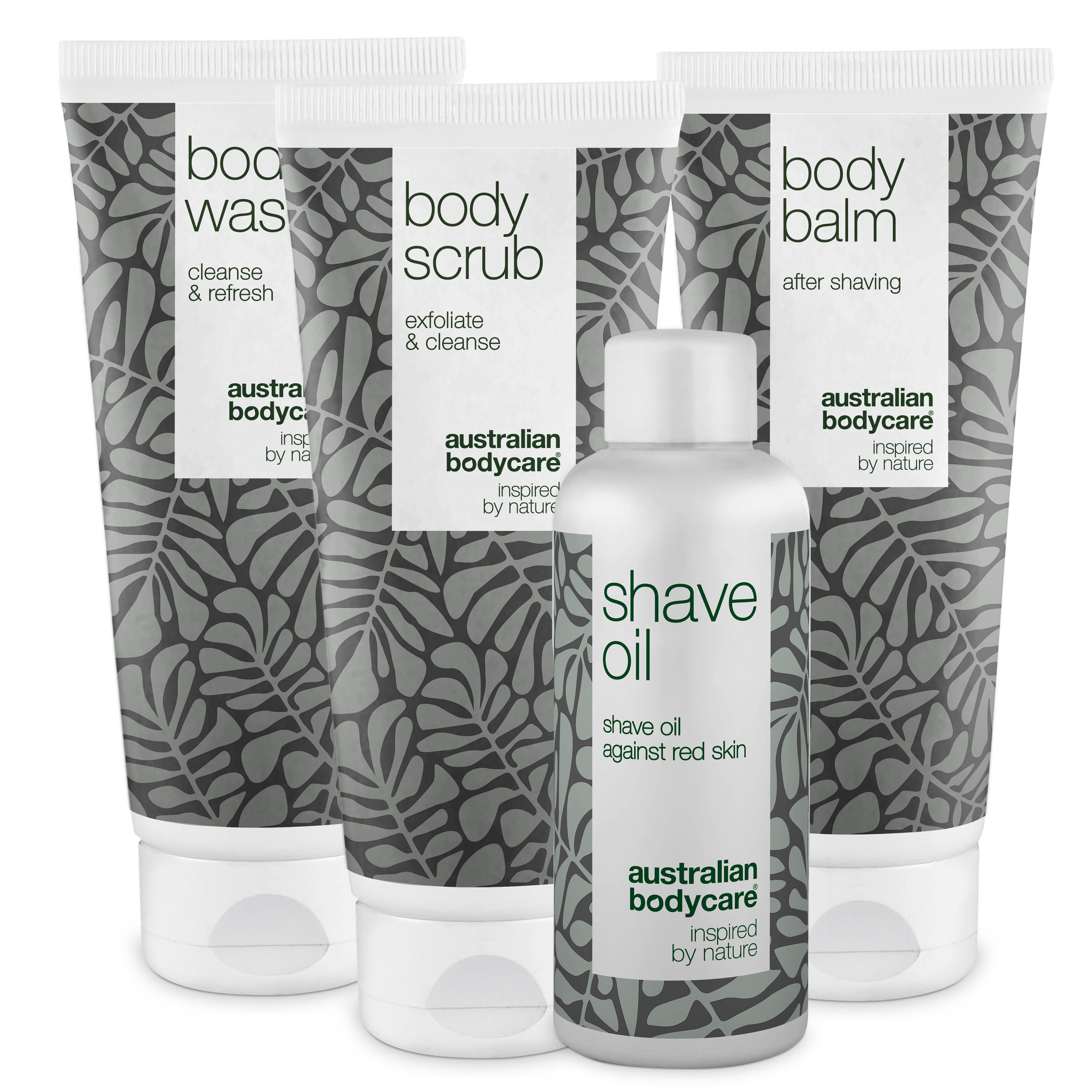 Quatre produits : Body Wash, Body Scrub, Body Balm et Shave Oil. Tous en tubes et flacons blancs avec motif de feuilles.