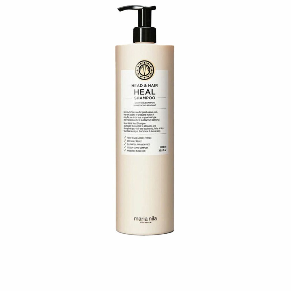 Beige shampoo fles met zwarte pomp. Opschrift: HEAD & HAIR HEAL SHAMPOO. Merk: Maria Nila.