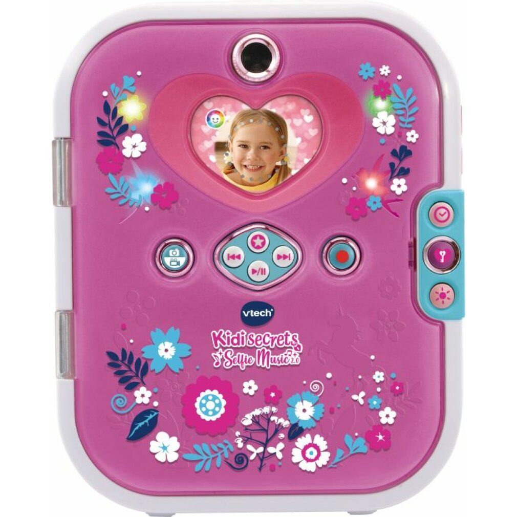 Journal VTech Kidisecrets Selfie Music 2.0 rose avec cadre photo cœur, fleurs et boutons de commande.