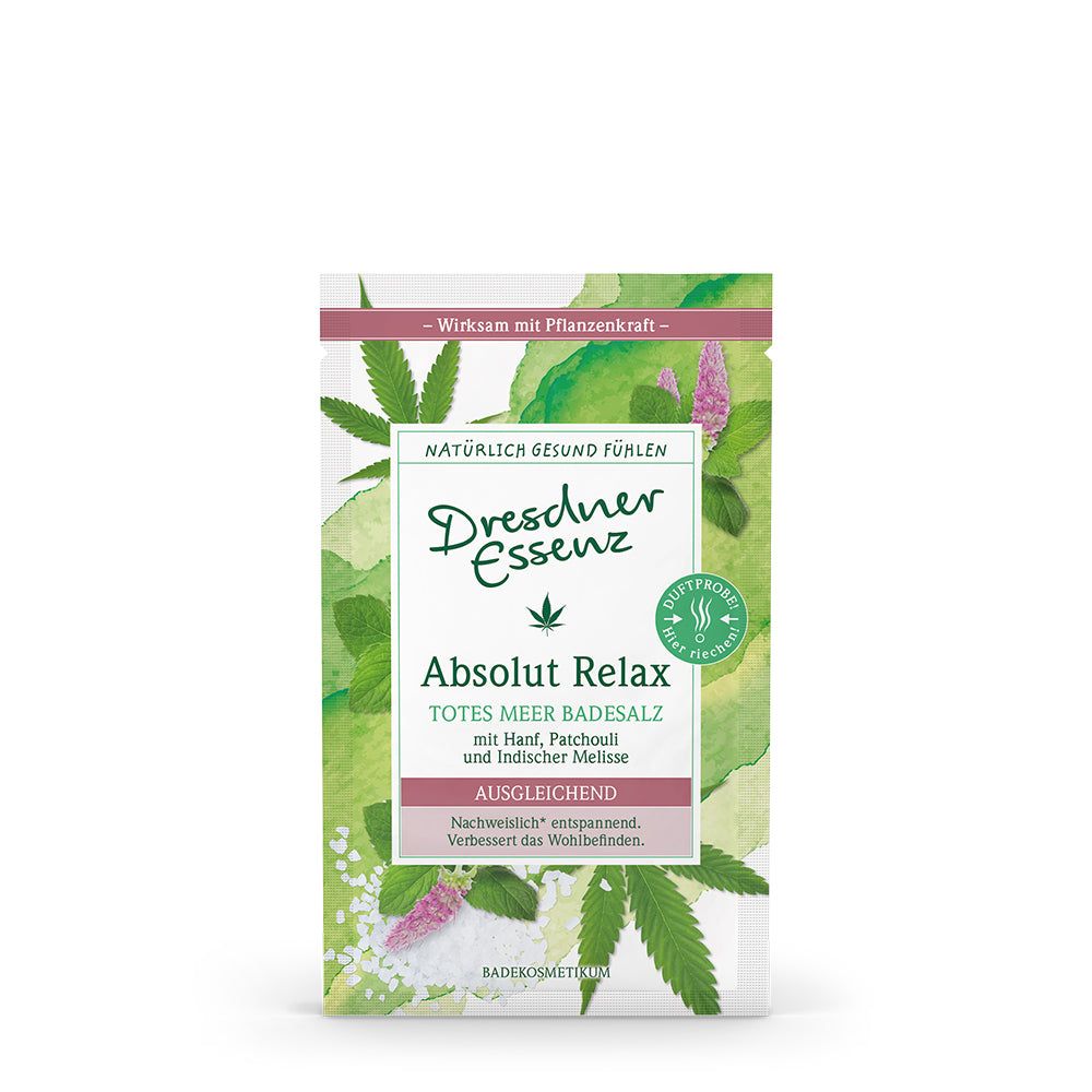 Zakje Dresdner Essenz badzout Absolut Relax. Groen-wit ontwerp met productnaam en ingrediënten. Sticker 'geurmonster'.