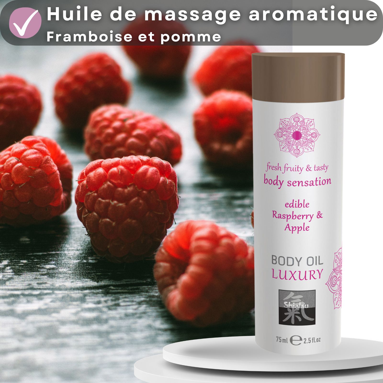 Flacon d'huile corporelle Shiatsu Luxury Framboise & Pomme, 75ml, avec des framboises et une femme.