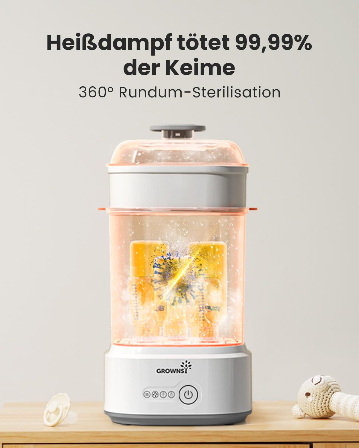 Grownsy sterilisator met babyflessen binnenin, verlicht.