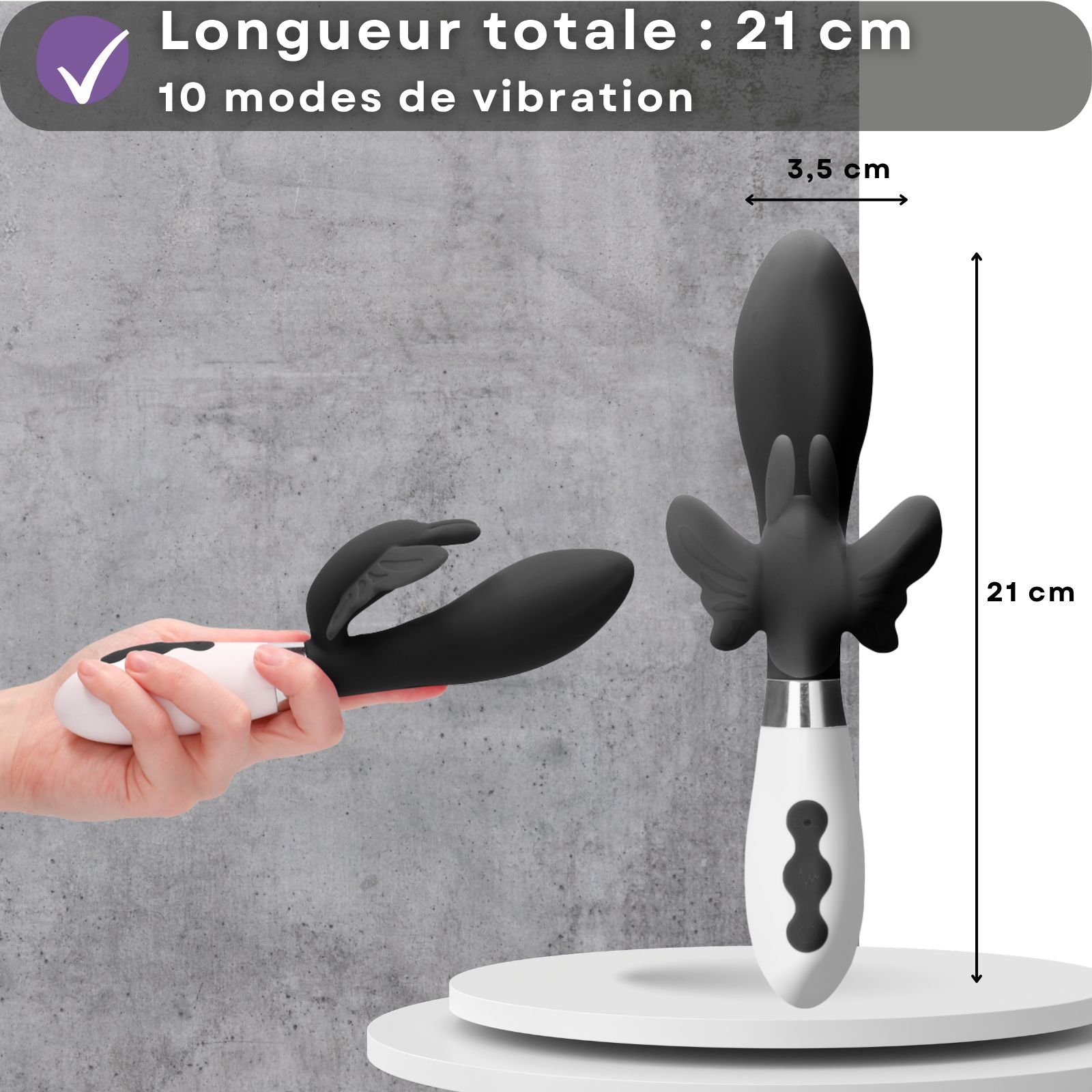 Vibromasseur noir et blanc, oreilles de lapin. Longueur 21 cm, diamètre 3,5 cm. 10 modes de vibration.