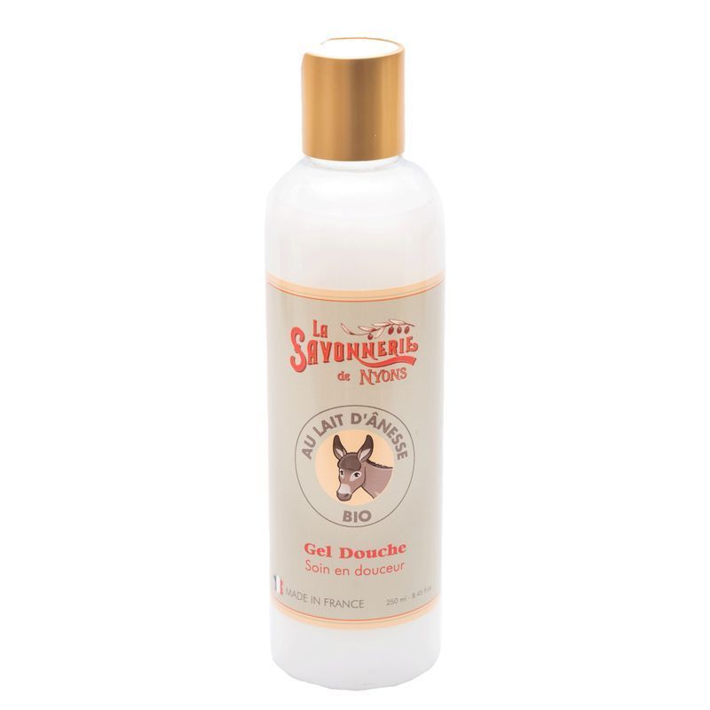 Flacon de gel douche avec bouchon doré. Étiquette avec logo et texte "Au Lait d'Anesse Bio".