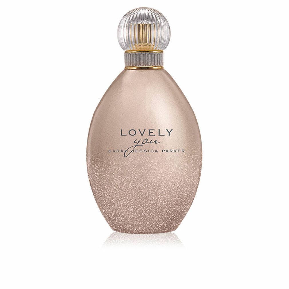 Peer-vormige fles, goudkleurig met glitter. Transparante dop. Tekst: Lovely You, Sarah Jessica Parker.