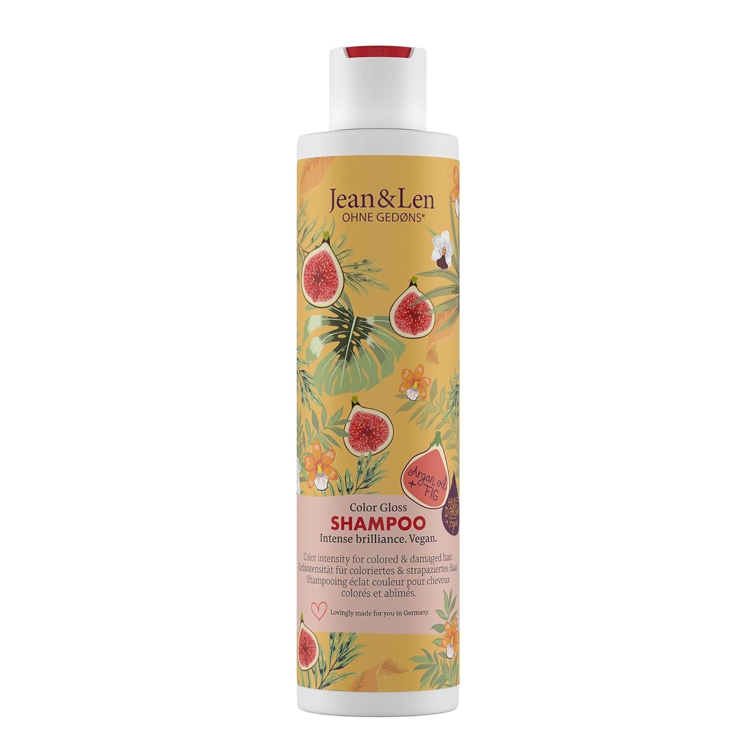 Shampoofles met geel etiket, vijgen- en bladerenpatroon. Opschrift: Jean & Len, Color Gloss Shampoo.