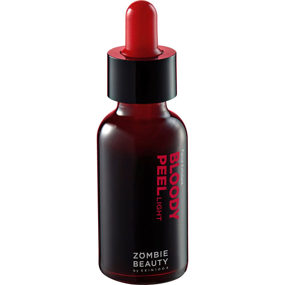 Donkere fles met rode vloeistof en pipet. Opschrift 'BLOODY PEEL LIGHT' en 'ZOMBIE BEAUTY'.
