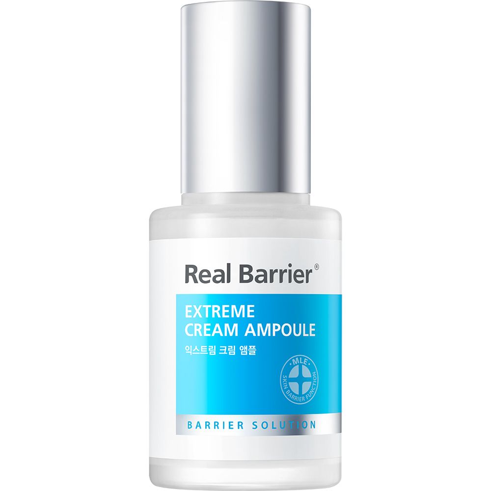 Transparante flacon met zilveren dop. Opschrift: REAL BARRIER Extreme Cream Ampoule. Blauw etiket met logo en tekst.