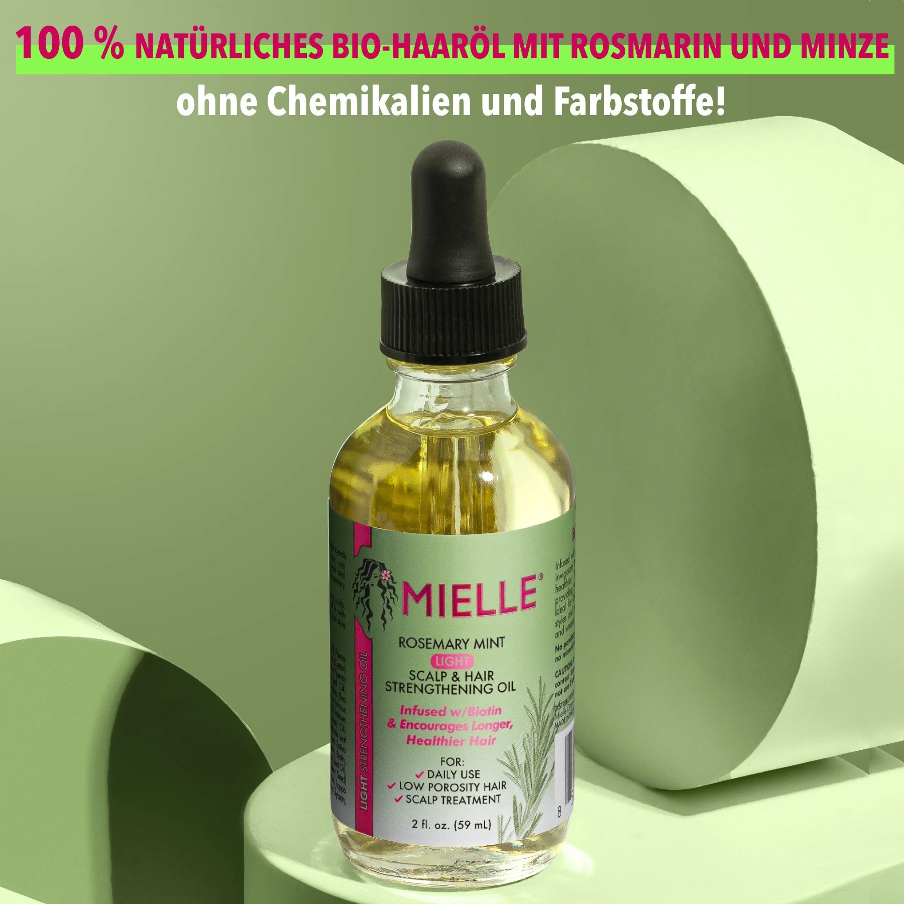 Flacon d'huile capillaire Mielle Organics avec pipette. Texte: Rosemary Mint Light, 100% huile capillaire bio naturelle au romarin et à la menthe, sans produits chimiques ni colorants.