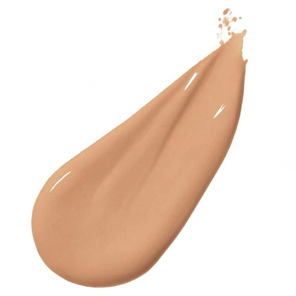 Lichte, vloeibare foundationkleur. De textuur is glanzend en heeft een druppelvorm.