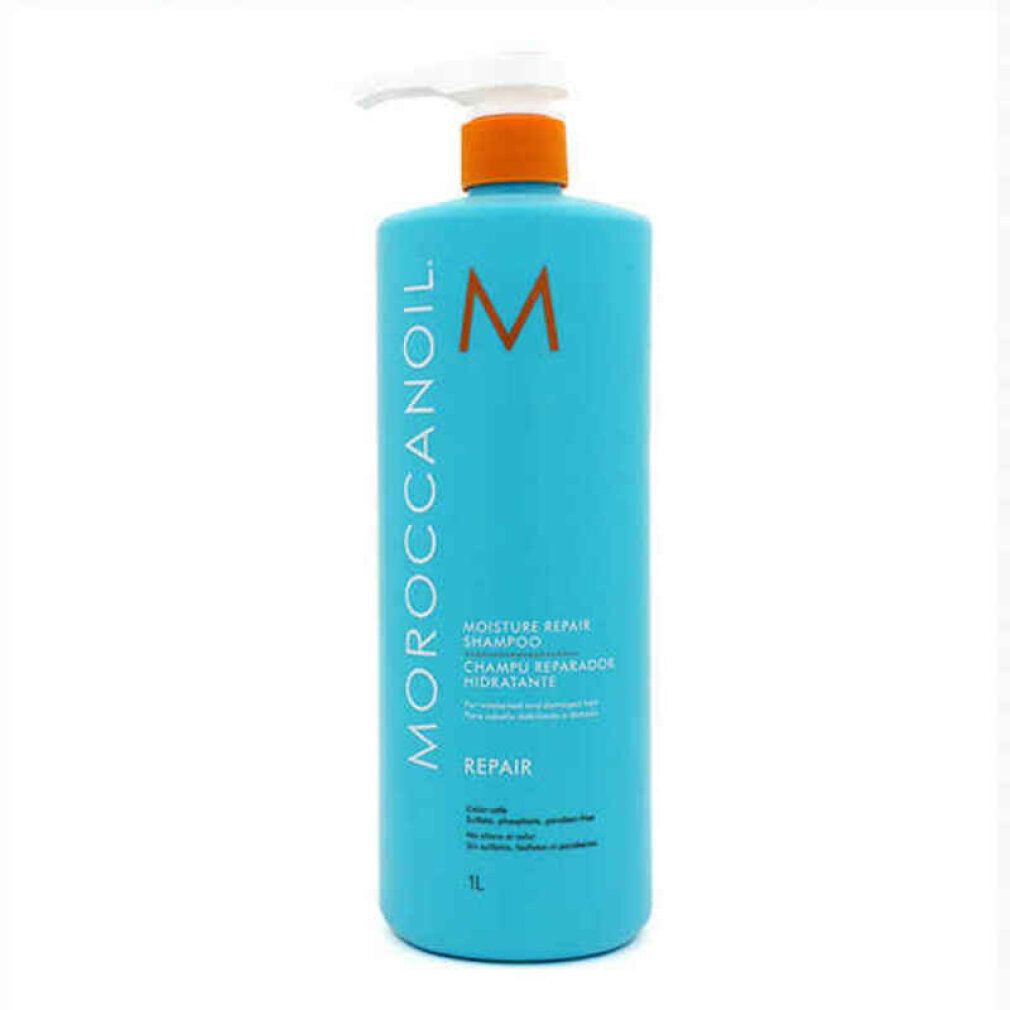 Turquoise shampoo fles met witte pomp. Opschrift: Moroccanoil, Moisture Repair Shampoo, Repair. Oranje logo.