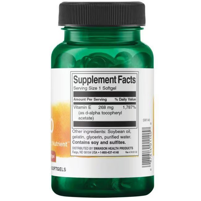 Dos du flacon vert. Étiquette avec "Supplement Facts", "Vitamin E" et informations nutritionnelles. Contient soja et sulfites.