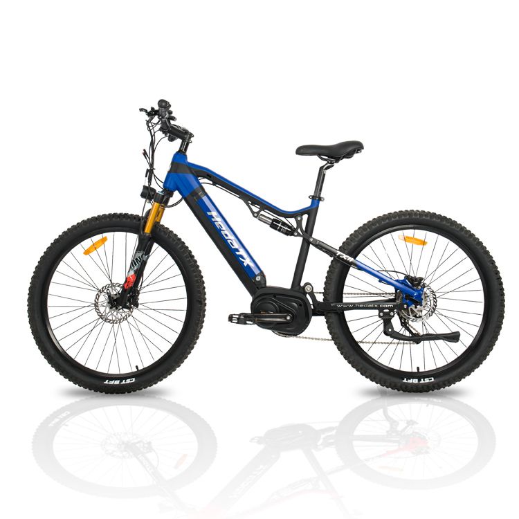 VTT électrique HedaTX TX11 noir et bleu. Moteur central, batterie 48V 15Ah. Gros pneus, freins à disque, suspension.