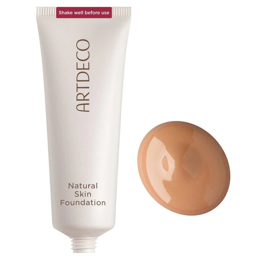 Tube blanc Artdeco Natural Skin Foundation et goutte de fond de teint. Inscription: Shake well before use.