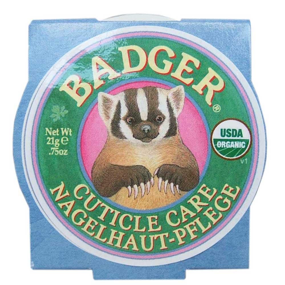 Boîte ronde avec couvercle. Sur le couvercle : logo blaireau, texte BADGER, Cuticle Care. Sceau USDA Organic.